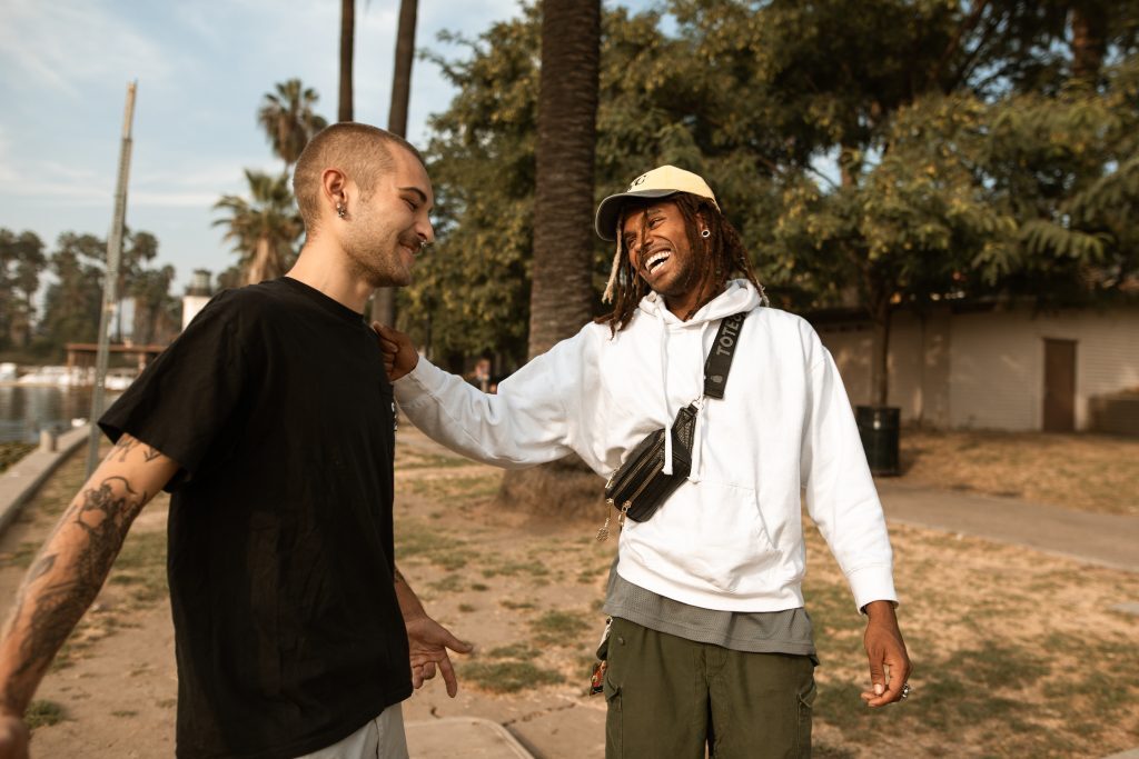 two men friends laughing joking